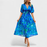 Clara | Eleganta ziedu midi kleita